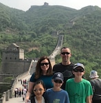 U.S. Army Maj. Jeremiah VanDorsten stands with his family (from left, Andrea, Mae, Loyal and Isaac) atop the Great Wall of China near Beijing May 11, 2019.

Vandorsten adopted his daughter, Lily, the following day. (Photo provided)