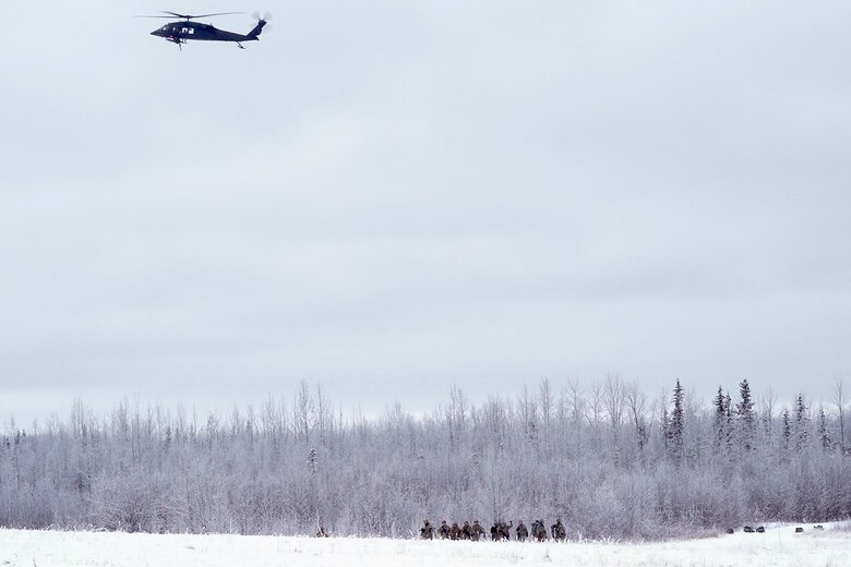 A UH-60 Black Hawk helicopter from the Alaska Army National Guard approaches Neibhur Drop Zone, Nov. 26, 2019, to assist Soldiers assigned to the 6th Brigade Engineer Battalion (Airborne), 4th Infantry Brigade Combat Team (Airborne), 25th Infantry Division, U.S. Army Alaska, in honing their life-saving and Medevac hoist skills for the paratroopers’ upcoming rotation to the Joint Readiness Training Center at Fort Polk, La.