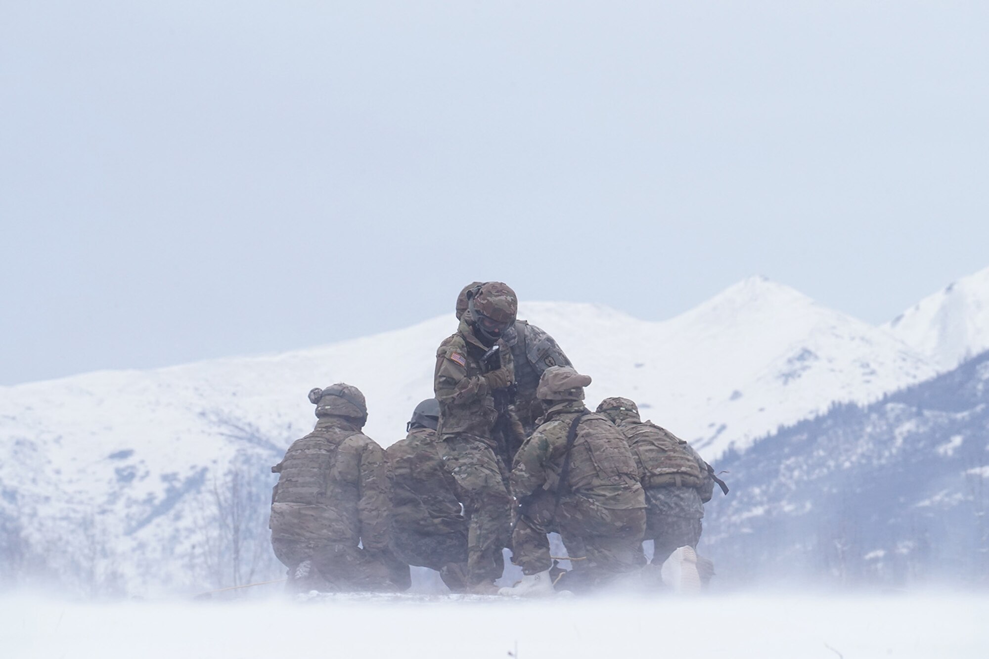 Medics from the 6th Brigade Engineer Battalion (Airborne), 4th Infantry Brigade Combat Team (Airborne), 25th Infantry Division, U.S. Army Alaska, train with aviators from the Alaska Army National Guard at Neibhur Drop Zone, Nov. 26, 2019, to hone their life-saving and Medevac hoist skills for the paratroopers’ upcoming rotation to the Joint Readiness Training Center at Fort Polk, La.