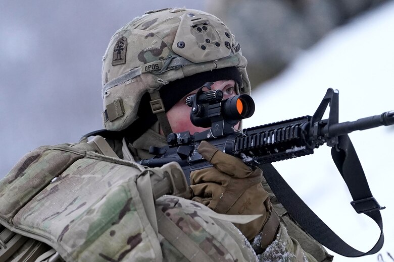 Spc. Michael Moulton, a native of Juneau, Alaska, assigned to Headquarters and Headquarters Company, 6th Brigade Engineer Battalion (Airborne), 4th Infantry Brigade Combat Team (Airborne), 25th Infantry Division, U.S. Army Alaska, pulls security while training with aviators from the Alaska Army National Guard at Neibhur Drop Zone, Nov. 26, 2019, to hone their life-saving and Medevac hoist skills for the paratroopers’ upcoming rotation to the Joint Readiness Training Center at Fort Polk, La.