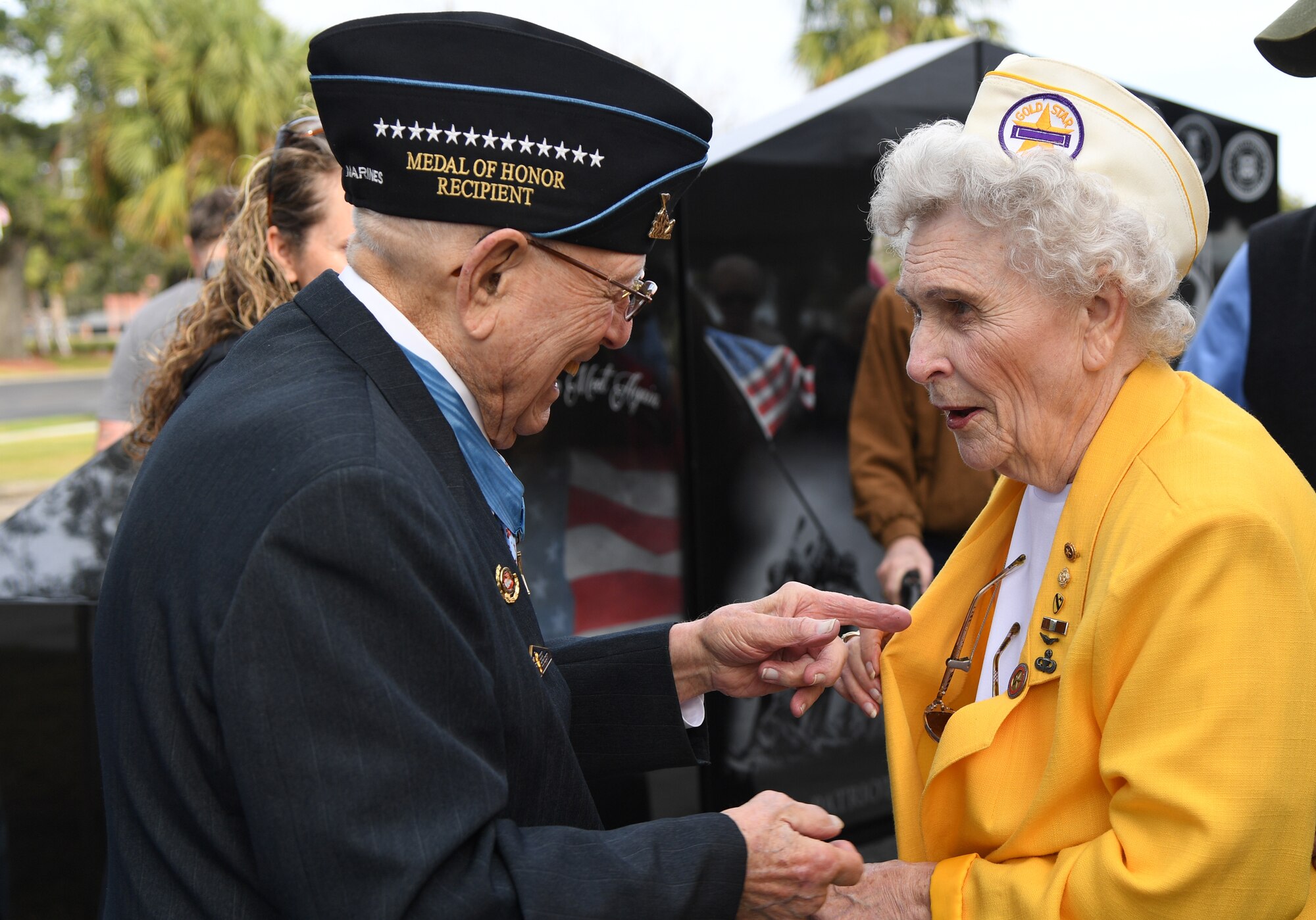 U.S. Marine retired Warrant Officer Hershel "Woody" Williams, World War II Medal of Honor recipient, speaks with Emily Crowder, spouse of U.S. Army retired Maj. Albert Crowder, during the Gold Star Families Memorial Monument dedication ceremony at Guice Veterans Memorial Park in Biloxi, Mississippi, Nov. 23, 2019. The monument honors families of service men and women who sacrificed their lives while serving in the military. (U.S. Air Force photo by Kemberly Groue)