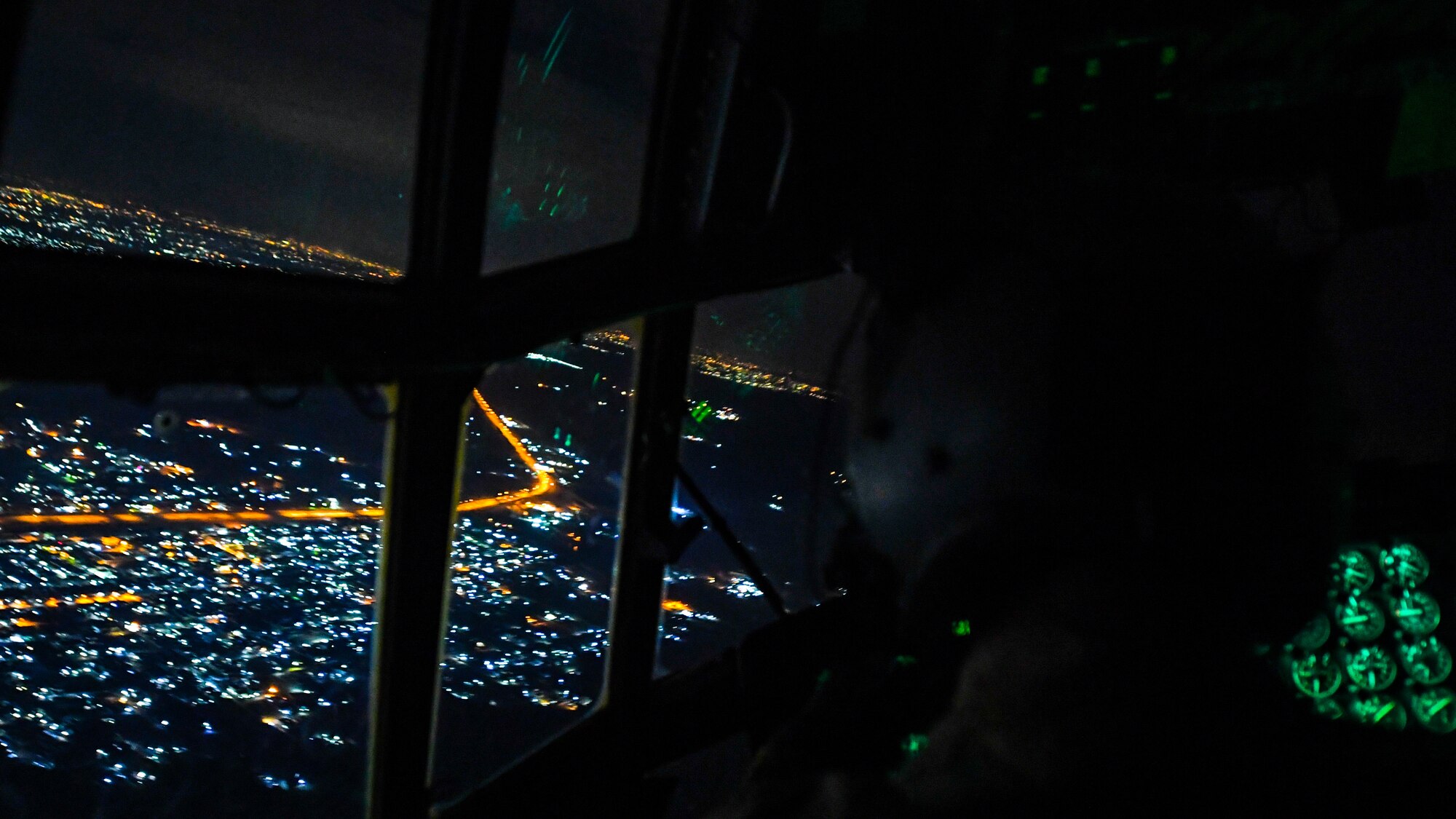 C-130 transports cargo between Kuwait and Iraq.