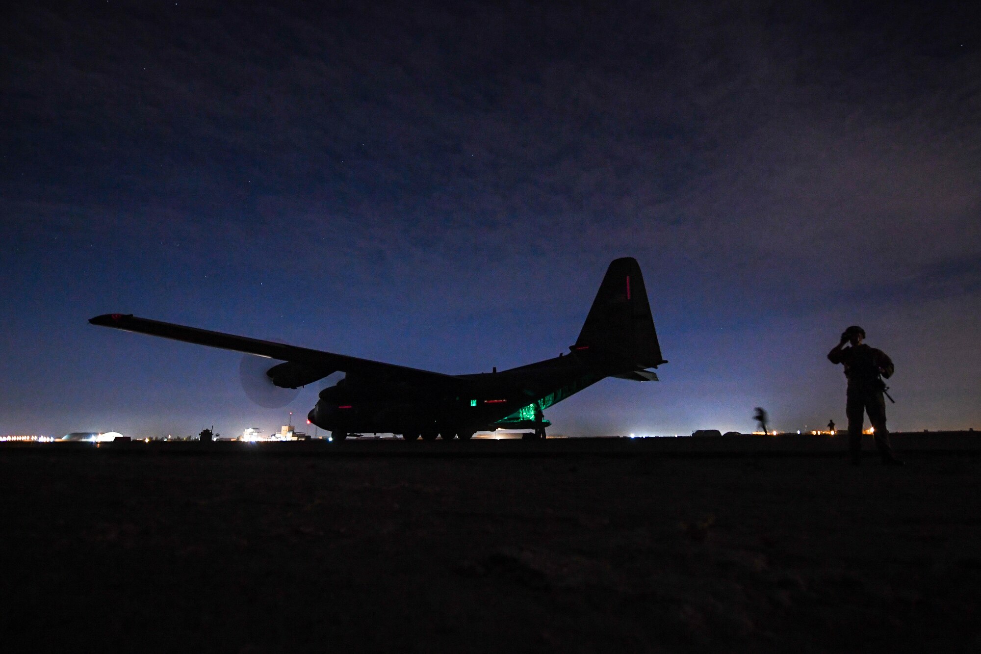 C-130 transports cargo between Kuwait and Iraq.