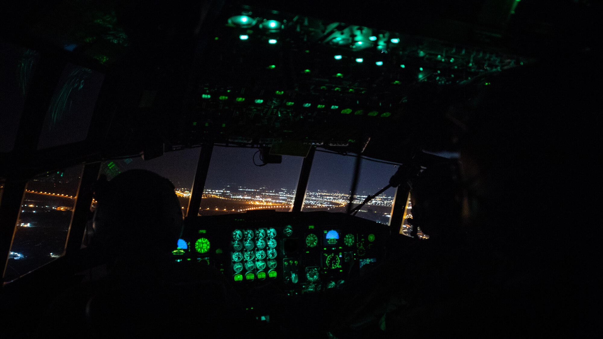 C-130 transports cargo between Kuwait and Iraq.