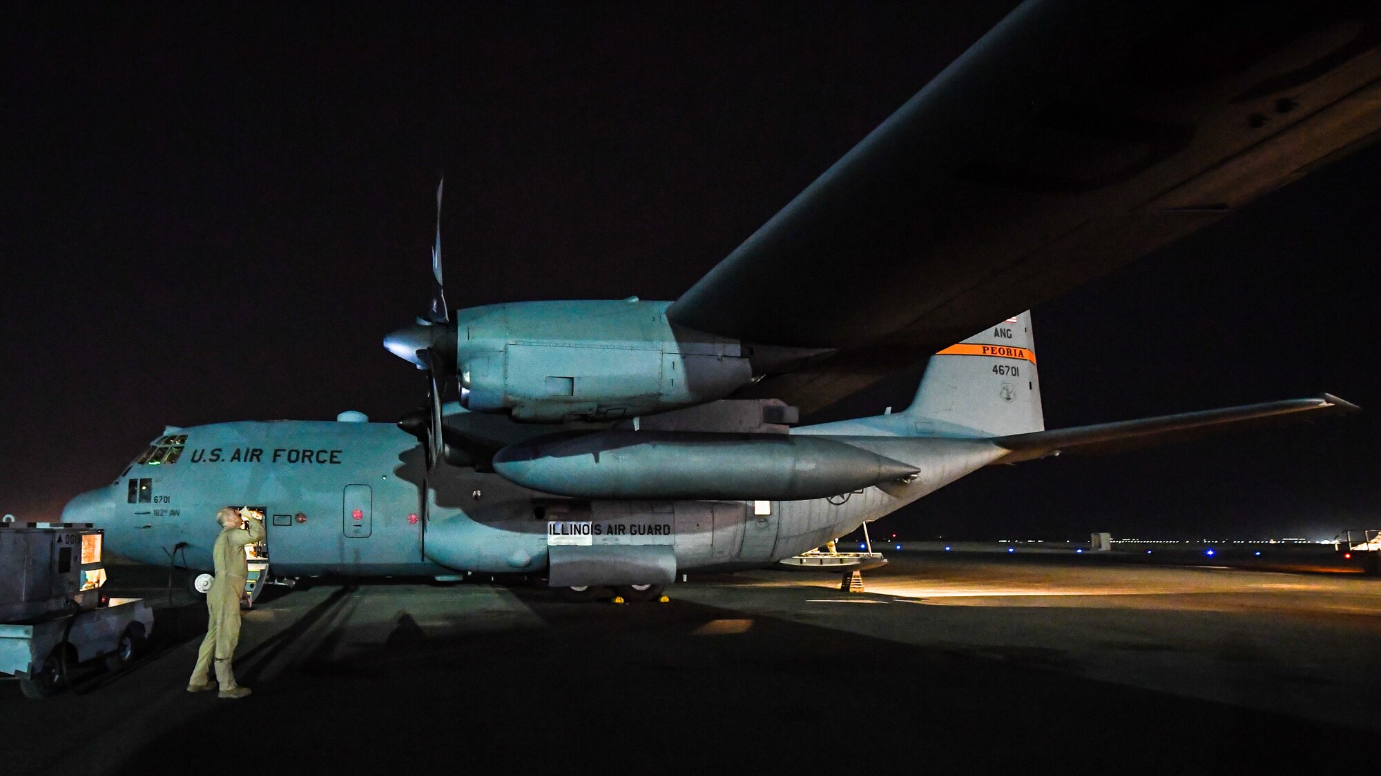 C-130 transports cargo between Kuwait and Iraq.