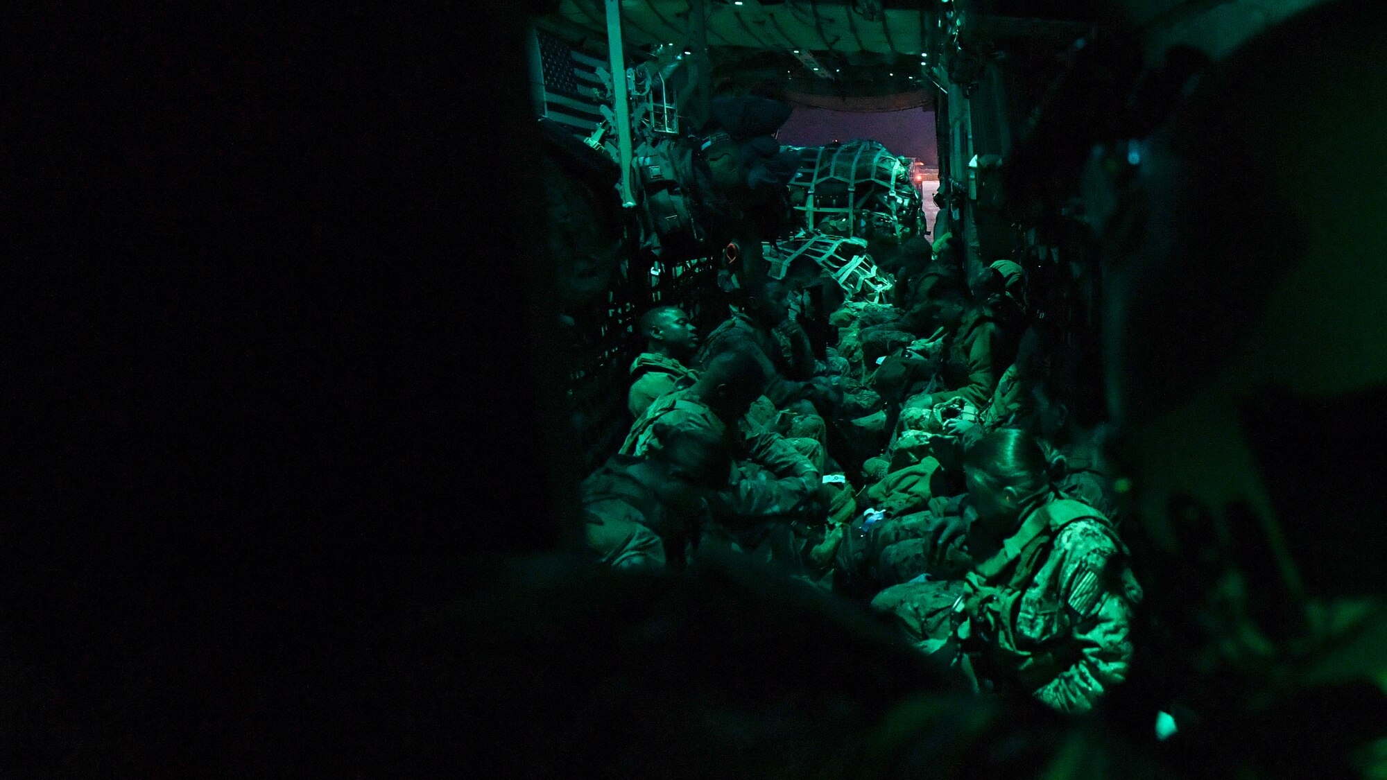 C-130 transports cargo between Kuwait and Iraq.