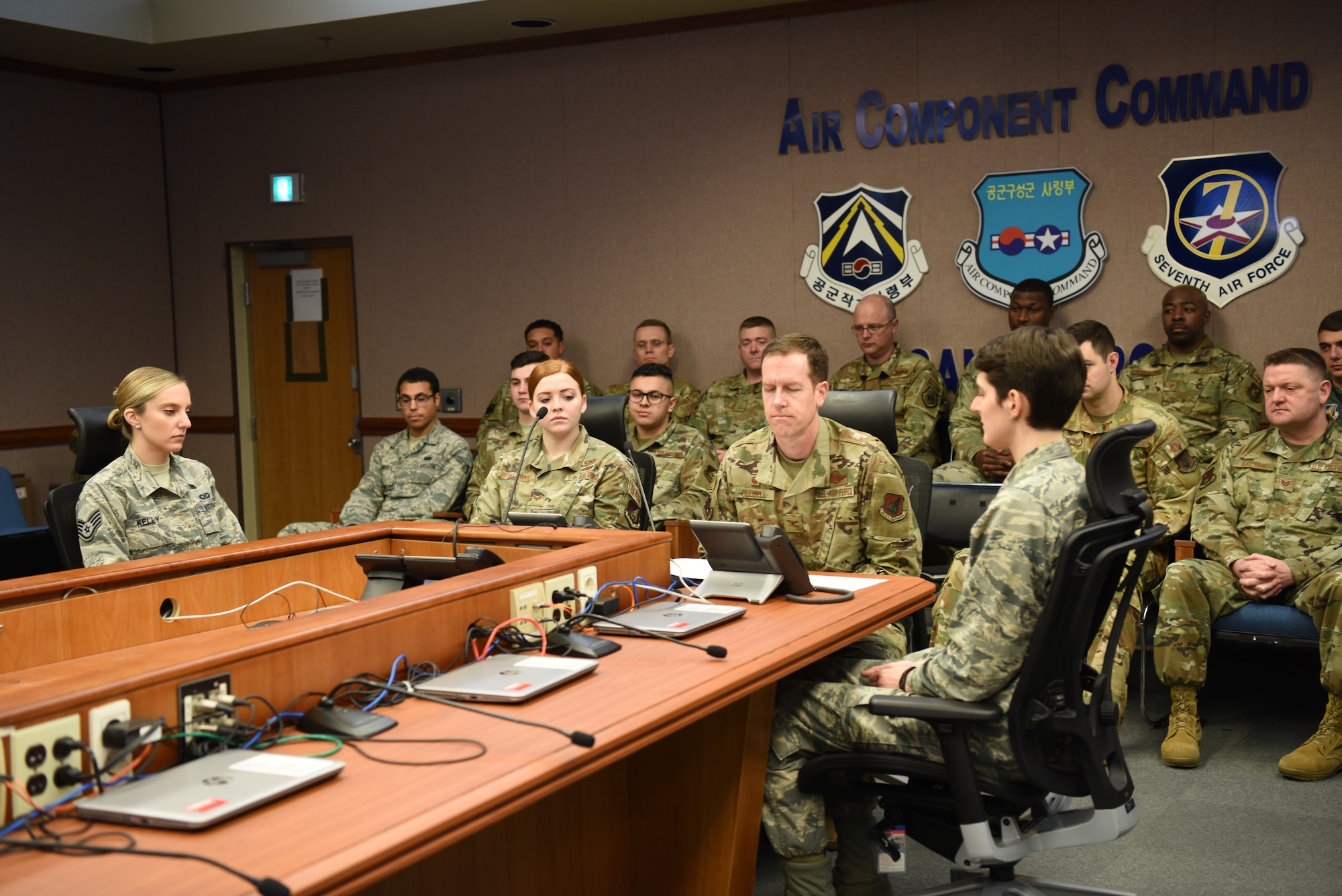 Col. Christopher Russell (center),607 Air Operations Center commander, joins AOC Airmen for a Thanksgiving morale call from President Donald Trump Nov. 29, 2019, at Osan Air Base, Republic of Korea. (U.S. Air Force photo by MSgt Beth Anschutz)