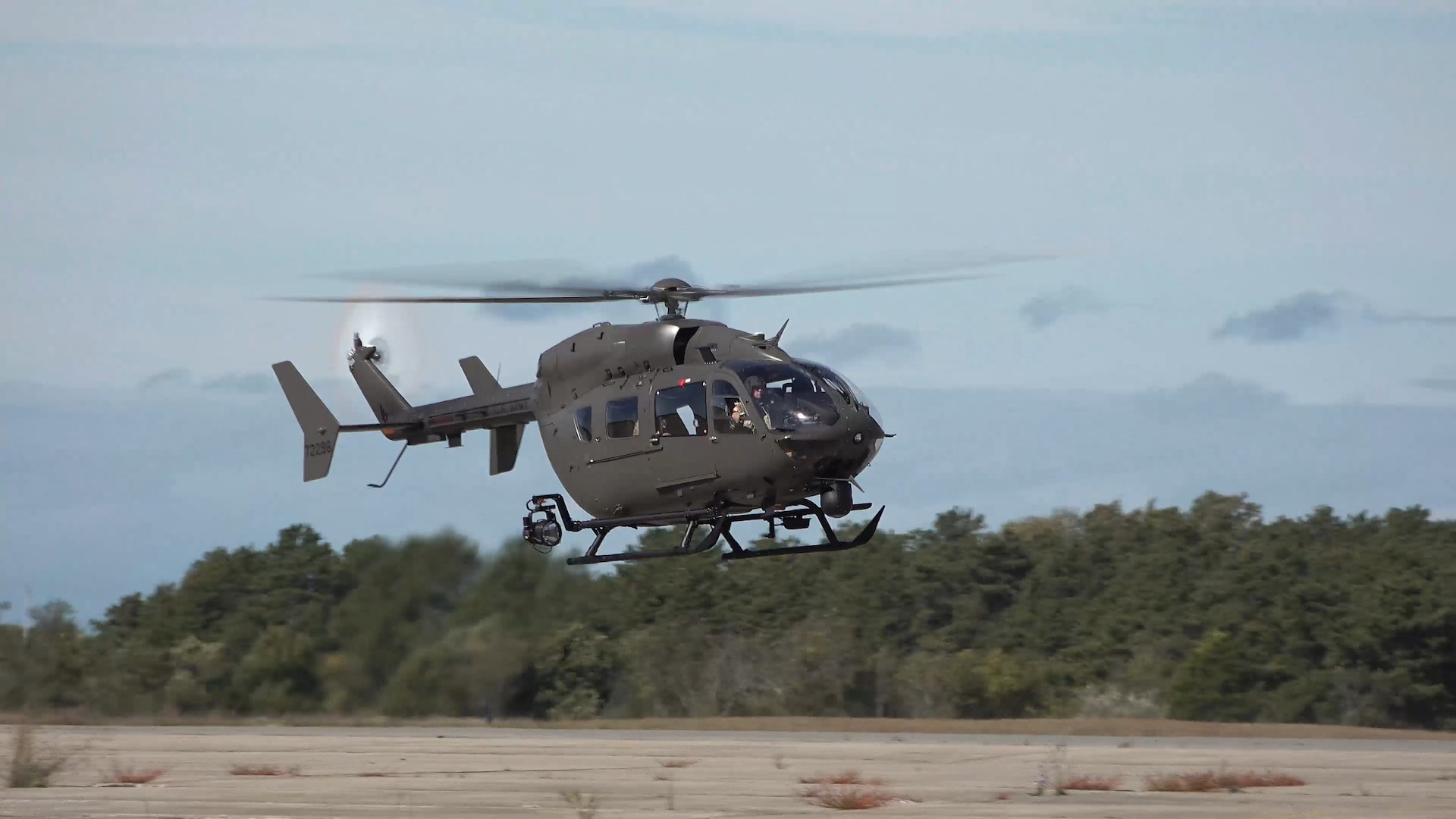 Maj. Gen. Gary W. Keefe, the adjutant general of the Massachusetts National Guard, takes a ride in one of the state's new Lakota helicopters during a demonstration of the Lakota camera/video downlink feed at Joint Base Cape Cod, Mass., Oct. 6, 2019.