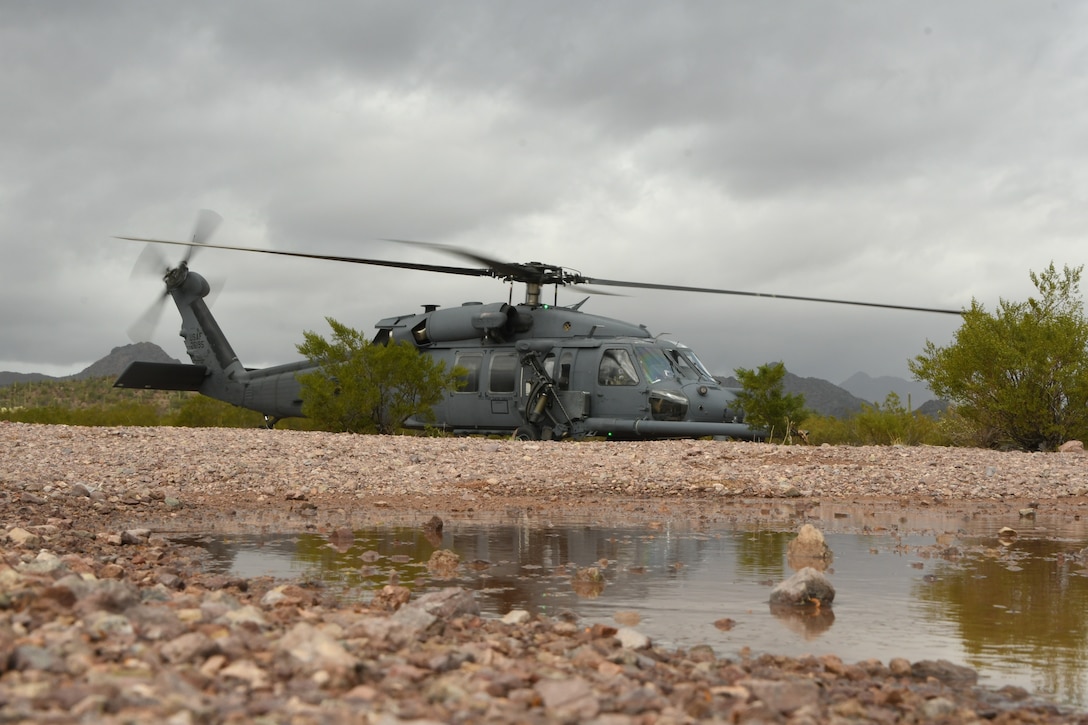 A U.S. Air Force HH-60G Pave Hawk sits at Lost Acres 
Landing Zone