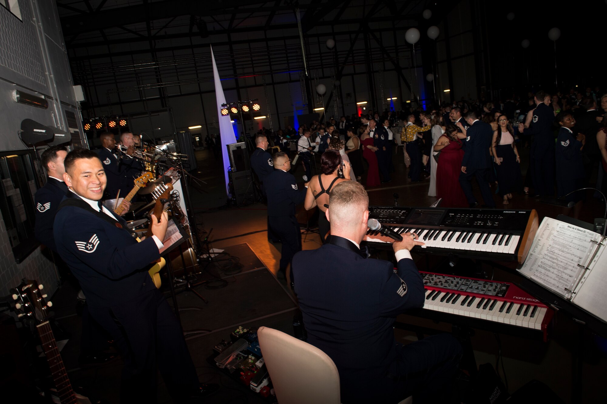 The U.S. Air Forces in Europe Jazz and Rock bands perform during the 72nd Air Force birthday ball at Ramstein Air Base, Germany, Sept. 21, 2019. The bands played two sets, a formal jazz set during the dinner portion and a dance set after the formal portion of the evening. (U.S. Air Force photo by Staff Sgt. Jonathan Bass)