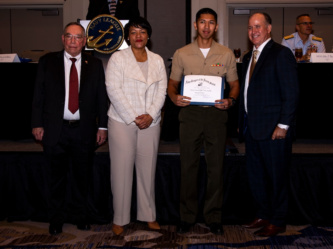 U.S. Marine Corps Cpl. Jomel F. Dellomes, an embarkation noncommissioned officer with 4th Marine Aircraft Wing, receives an award during the Navy League Military Appreciation Luncheon, New Orleans, Sept. 27, 2019. The Navy League awarded Dellomes for being the most outstanding NCO of 4th MAW. (U.S. Marine Corps photo by Lance Cpl. Jose Gonzalez)