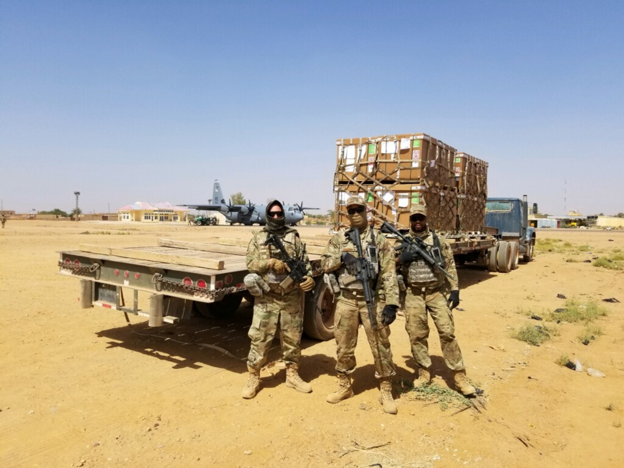 Tech. Sgts. James Baggott, Joshua Cummings, and Johnathan Simmmons, 403rd Logistics Readiness Squadron transportation specialists, deployed to Air Base 201, Agadez, Niger for a six-month tour conductions vehicle operations in the Logisitcs Readiness Flight for the 724 Expeditionary Air Base Squadron. The LRF was responsible for the transport of personnel, cargo and supplies. (U.S. Air Force photo provided by Tech. Sgt. James Baggott)