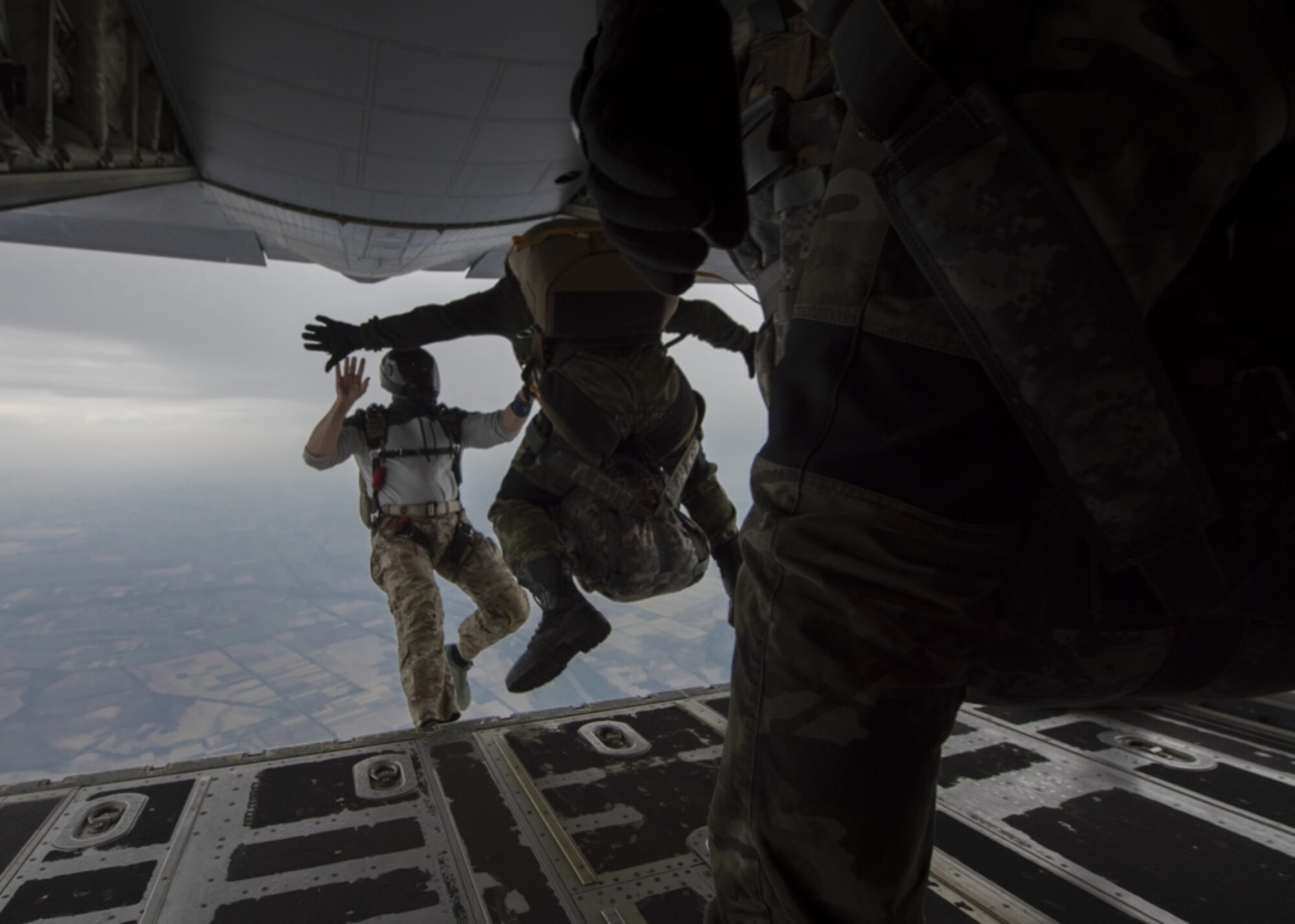 A U.S. military jumpmaster jumps with a student from the Bulgarian 68th Special Forces Brigade during a military free-fall course in Plovdiv, Bulgaria, Sept. 24, 2019. The military free-fall course was a central focus for Thracian Fall and the 37th Airlift Squadron provided primary aircraft support using their C-130J Super Hercules. (U.S. Air Force photo by Staff Sgt. Kirsten Brandes)