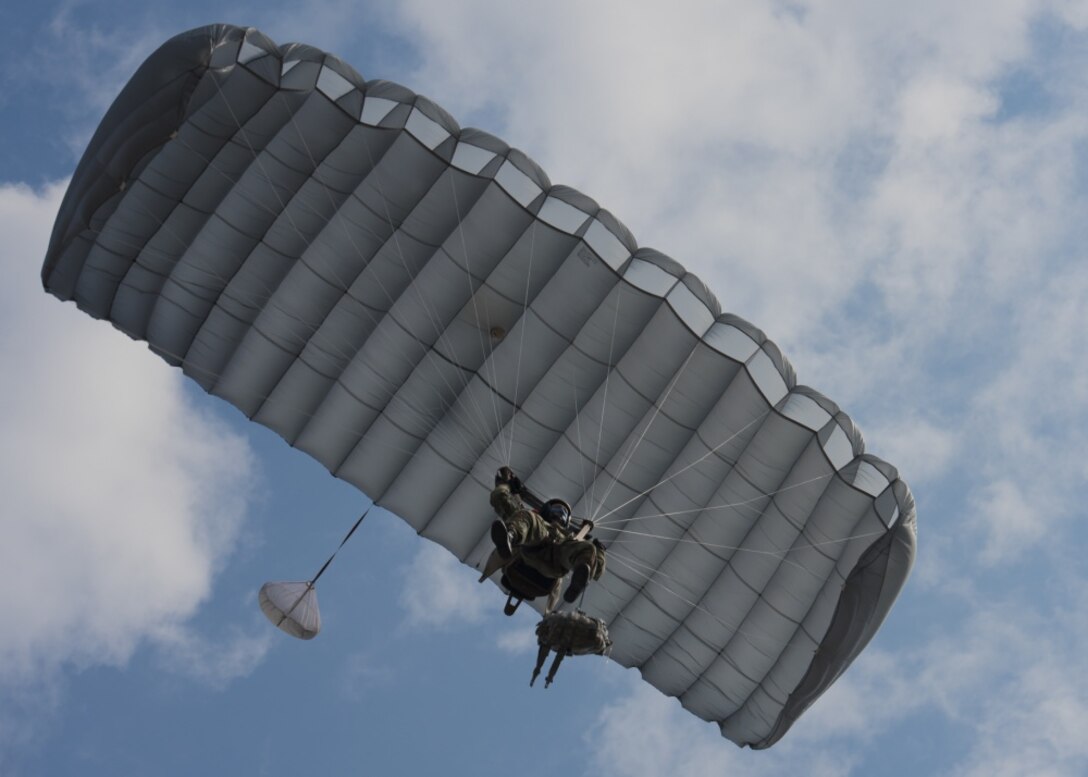 A jumper from the Bulgarian 68th Special Forces Brigade parachutes into Cheshnegirovo drop zone in Plovdiv, Bulgaria, Sept. 26, 2019. The military free-fall course will allow members of the 68th SFB to qualify on a new type of parachute. (U.S. Air Force photo by Staff Sgt. Kirsten Brandes)