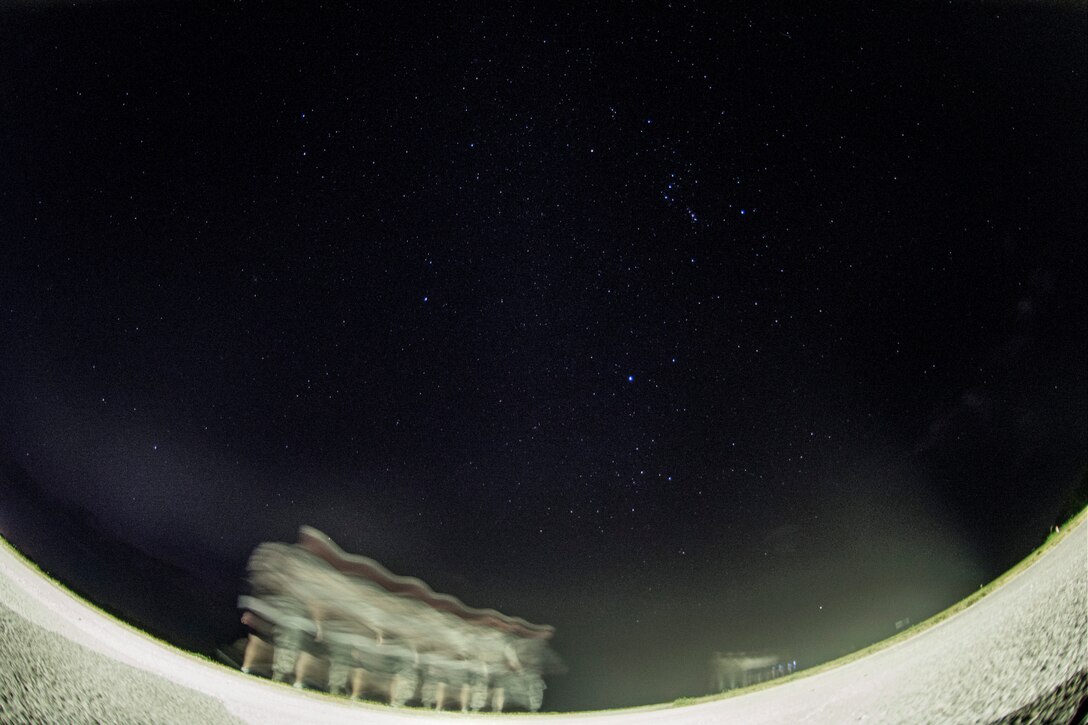Airmen assigned to the 47th Flying Training Wing at Laughlin Air Force Base, Texas walk during the 5-kilometer “Walk with the Chief” ruck on Sept. 30, 2019. Approximately 30 members of Team XL came out in the early hours on Monday morning to increase their deployment readiness and have an opportunity to connect with Zackery in an informal setting. (U.S. Air Force photo by Senior Airman Marco A. Gomez)