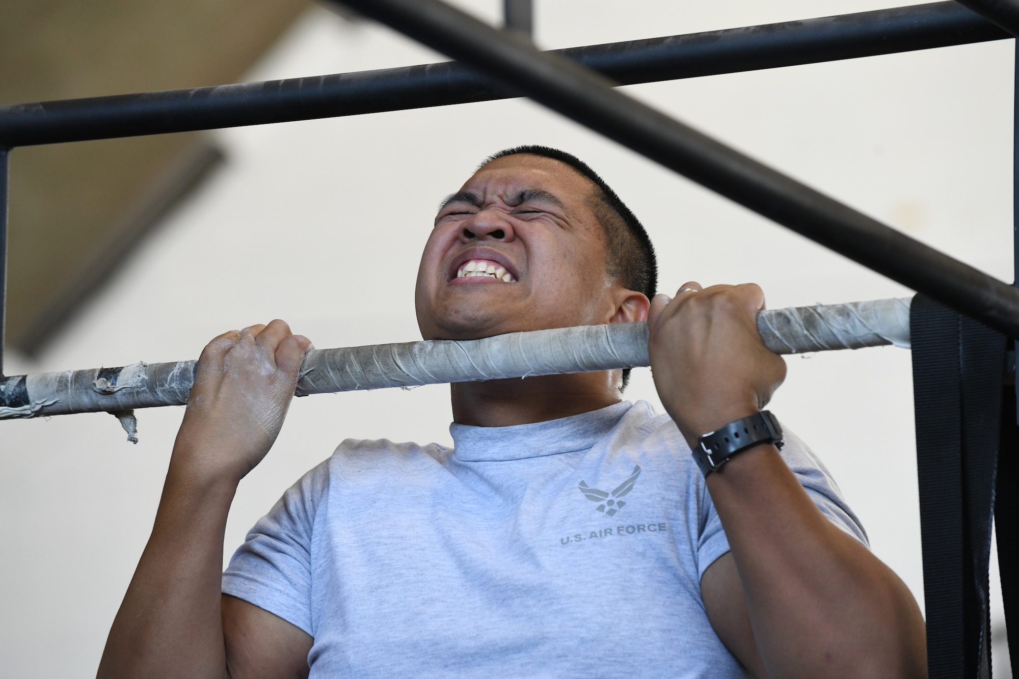 Staff Sgt. Jefferey Sales, a 28th Security Forces Squadron combat arms instructor, performs a flexed arm hang during the German Armed Forces Proficiency Test at Ellsworth Air Force Base, S.D., Sept. 21, 2019. Eleven Raider Airmen participated in the GAFP alongside Army ROTC cadets and South Dakota Army National Guardsmen. Participants were required to complete six events in order to qualify for the coveted German Armed Forces Proficiency Badge. (U.S. Air Force Airman 1st Class Christina Bennett)