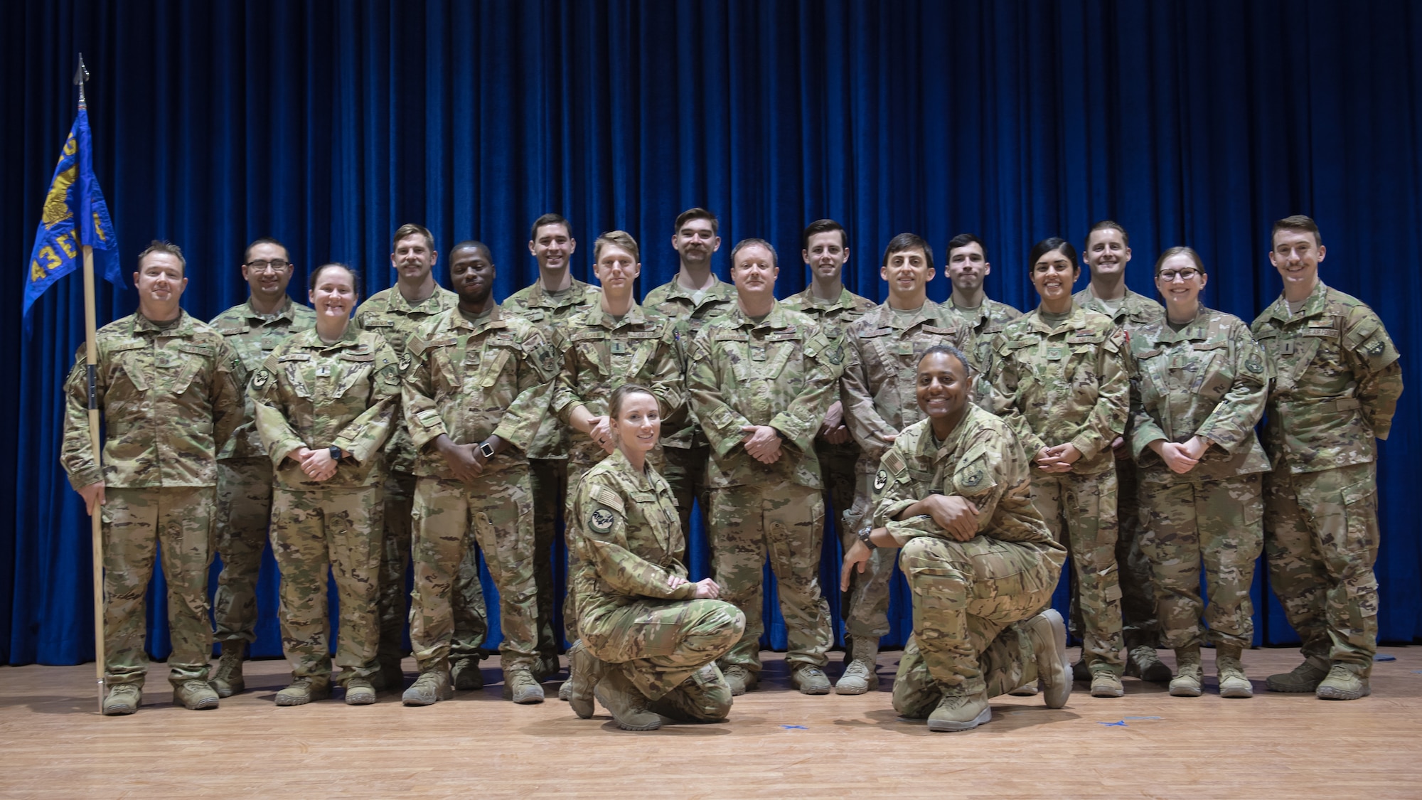 Members of the 43rd Expeditionary Electronic Combat Squadron pose for a group photo after the unit's inactivation ceremony at Ali Al Salem Air Base, Kuwait, Sept. 30, 2019. (U.S. Air Force photo by Tech. Sgt. Daniel Martinez)