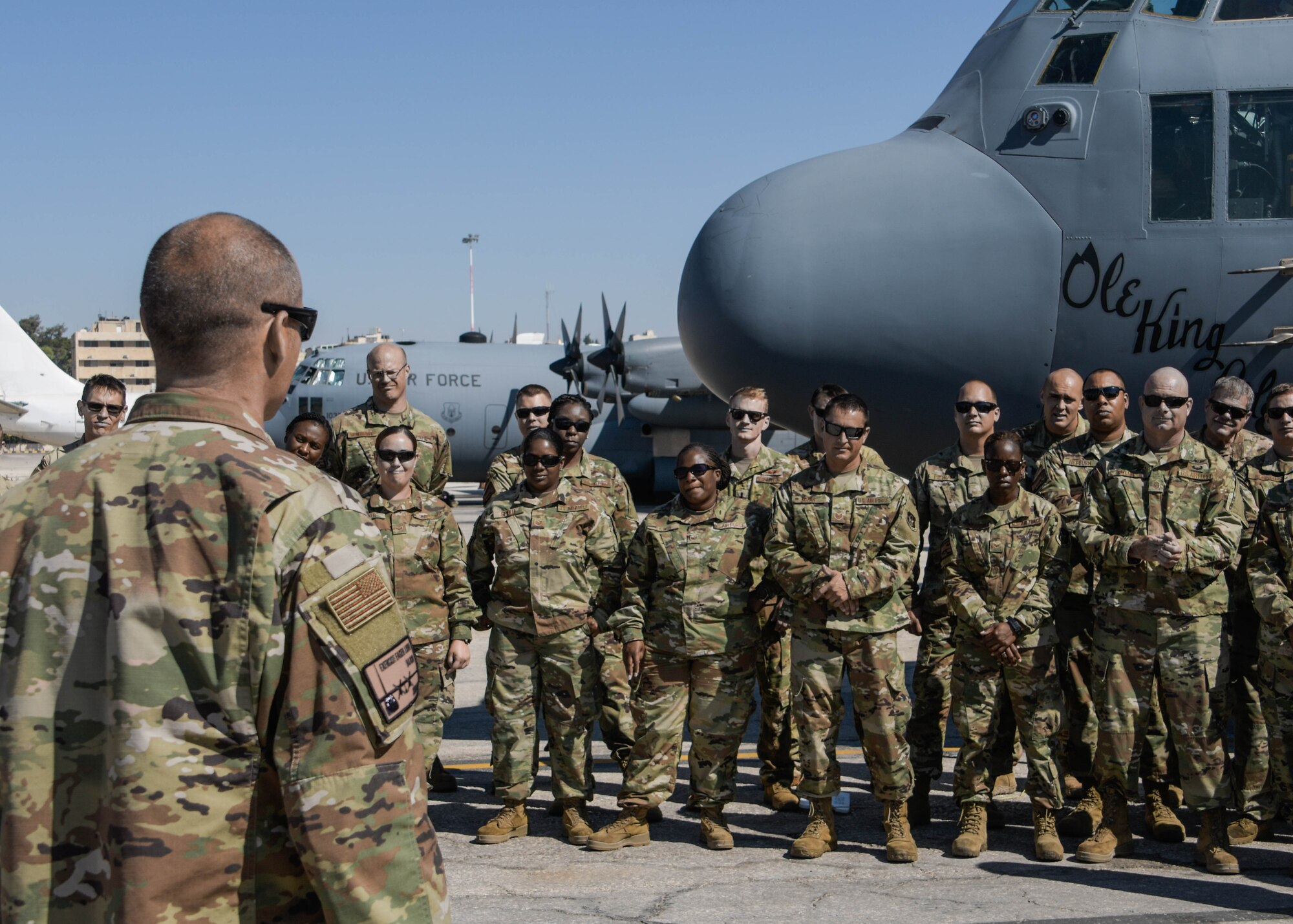 Chief Master Sgt. Marvin Jones speaks to Airmen from Dobbins Air Reserve Base participating in Exercise Eager Lion in Jordan after receiving a signed photograph on Sept. 6, 2019. Eager Lion is a multi-national exercise where Dobbins Air Reserve Base is the primary provider of air support. (U.S. Air Force photo by Senior Airman Josh Kincaid)