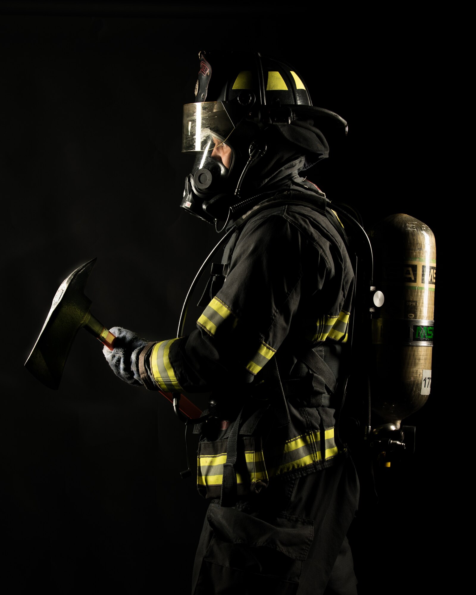 Airman 1st Class Dylan Dykes, 436th Civil Engineer Squadron driver operator, poses Oct. 1, 2019, at Dover Air Force Base, Del. During Fire Prevention Week, the 436th CES firefighters provide the Dover community with lifesaving education in an effort to decrease fire safety hazards.  (U.S. Air Force photo by Mauricio Campino)