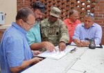 Sgt. 1st Class Kevin McClatchey conducts a site visit with members of the department of public works Sept. 18 at Fort Bragg, North Carolina, in preparation for a contract award for minor construction. McClatchey and Capt. Steve Voglezon conducted 27 sites visits with DPW across Fort Bragg in order to accomplish contract awards prior to the end of the fiscal year. McClatchey and Voglezon are members of the 900th Contracting Battalion.