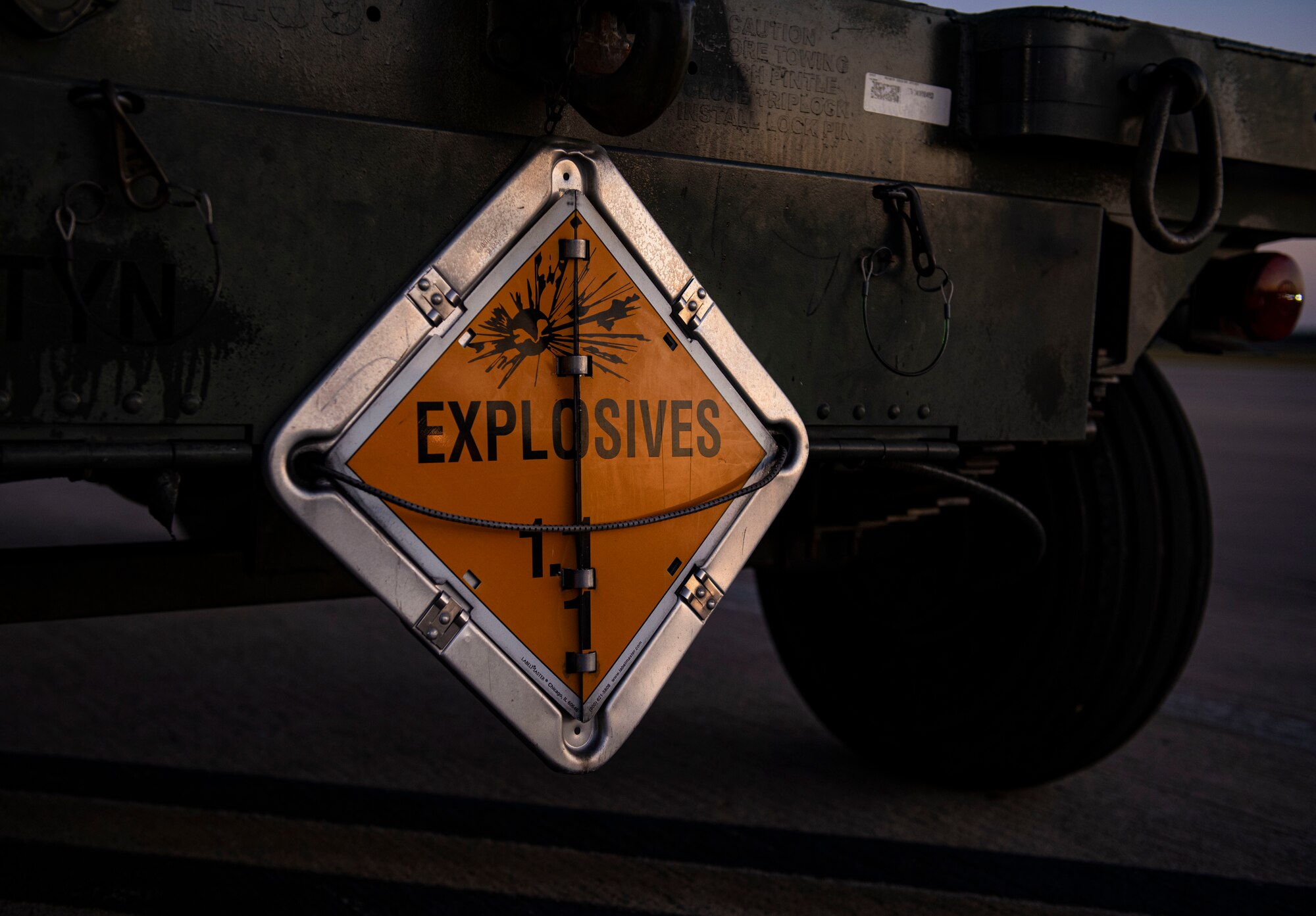 An “EXPLOSIVES” sign warns of potential hazards on the flightline during Combat Archer 19-12 on Tyndall Air Force Base, Fla., Sept. 24, 2019. Combat Archer is part of the 53rd Wing’s Weapons System Evaluation Program. (U.S. Air Force photo by Airman 1st Class Bailee A. Darbasie)