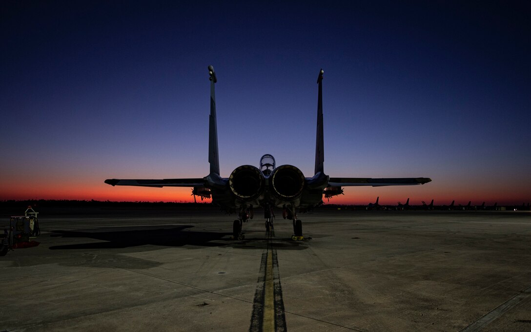 An F-15E Strike Eagle fighter jet assigned to the 422nd Test and Evaluation Squadron, Nellis Air Force Base, Nev., remains parked on the flightline during Combat Archer 19-12 on Tyndall AFB, Fla., Sept. 24, 2019. Combat Archer is part of the 53rd Wing’s Weapons System Evaluation Program. (U.S. Air Force photo by Airman 1st Class Bailee A. Darbasie)