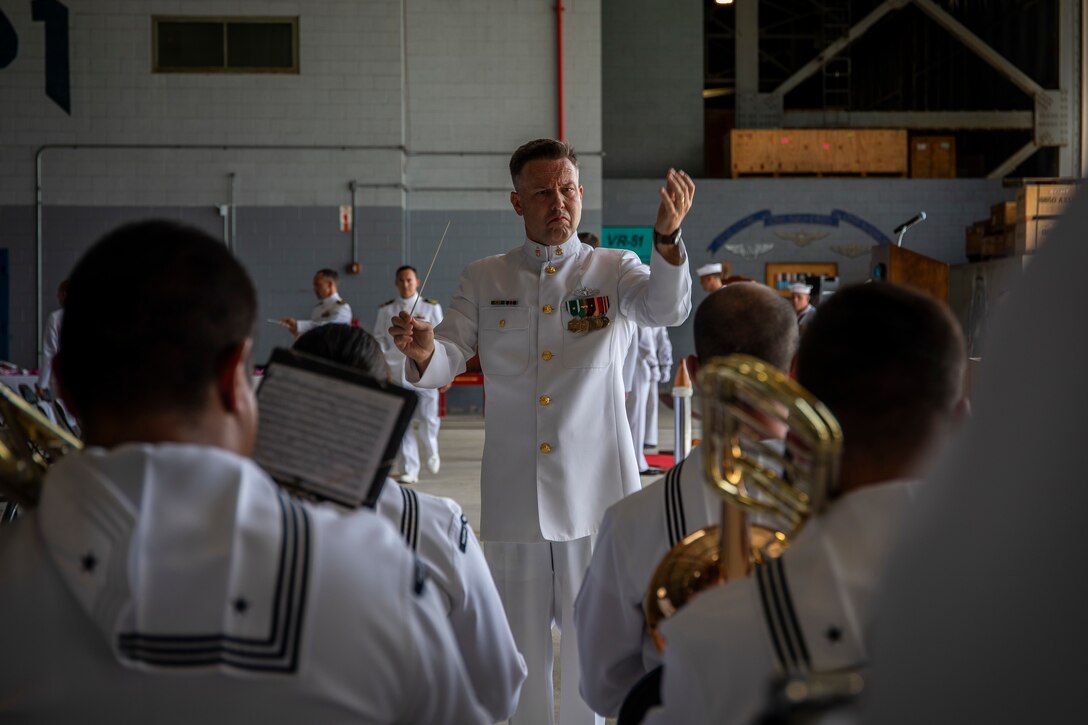 U.S. Navy Sailors with the U.S. Navy Pacific Fleet Band perform during the Fleet Logistics Support Squadron 51 change of command ceremony, Marine Corps Air Station Kaneohe Bay, Sept. 21, 2019. Cmdr. Matthew Abbot relinquished command to Cmdr. Steven Hacker. (U.S. Marine Corps photo by Cpl. Matthew Kirk)