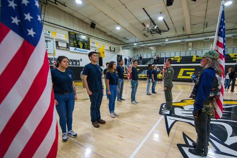 Lt. Col. Ryan Typolt, 29th Attack Squadron commander, recites the Oath of Enlistment to nine Delayed Entry Program enlistees, Sept. 27th, 2019, in Alamogordo, N.M. The DEP is the initial step for recruits while waiting for a basic training date. (U.S. Air Force photo by Staff Sgt. Christine Groening)