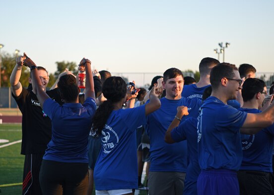 Members of Goodfellow Air Force Base “connect” before the 24-Hour Suicide Prevention Run/Walk to meet new people and start conversations at Goodfellow Air Force Base, Texas, Sept. 27, 2019. The event encouraged people to talk, connect, and find people they can rely on. (U.S. Air Force photo by Airman 1st Class Ethan Sherwood/Released)