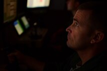 Remotely Piloted Aircraft aircrew fly simulated missions in an MQ-9 Reaper cockpit at Creech Air Force Base, Nevada, Sept. 4, 2019. The RPA mission is supported by Airmen in a variety of roles, including intelligence analysts, air traffic controllers and maintenance professionals. (U.S. Air Force photo by Senior Airman Haley Stevens)