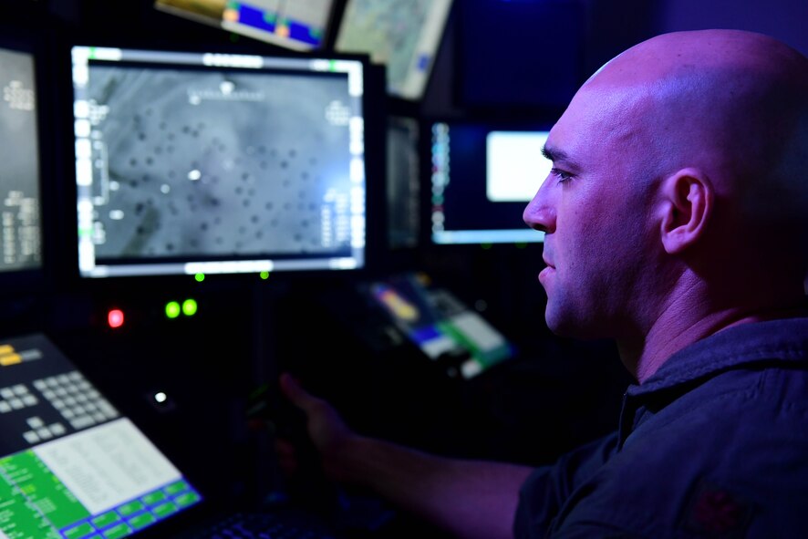 Remotely Piloted Aircraft aircrew fly simulated missions in an MQ-9 Reaper cockpit at Creech Air Force Base, Nevada, Sept. 4, 2019. The RPA mission is supported by Airmen in a variety of roles, including intelligence analysts, air traffic controllers and maintenance professionals. (U.S. Air Force photo by Senior Airman Haley Stevens)