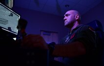 Remotely Piloted Aircraft aircrew fly simulated missions in an MQ-9 Reaper cockpit at Creech Air Force Base, Nevada, Sept. 4, 2019. The RPA mission is supported by Airmen in a variety of roles, including intelligence analysts, air traffic controllers and maintenance professionals. (U.S. Air Force photo by Senior Airman Haley Stevens)