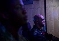 Remotely Piloted Aircraft aircrew fly simulated missions in an MQ-9 Reaper cockpit at Creech Air Force Base, Nevada, Sept. 4, 2019. The RPA mission is supported by Airmen in a variety of roles, including intelligence analysts, air traffic controllers and maintenance professionals. (U.S. Air Force photo by Senior Airman Haley Stevens)