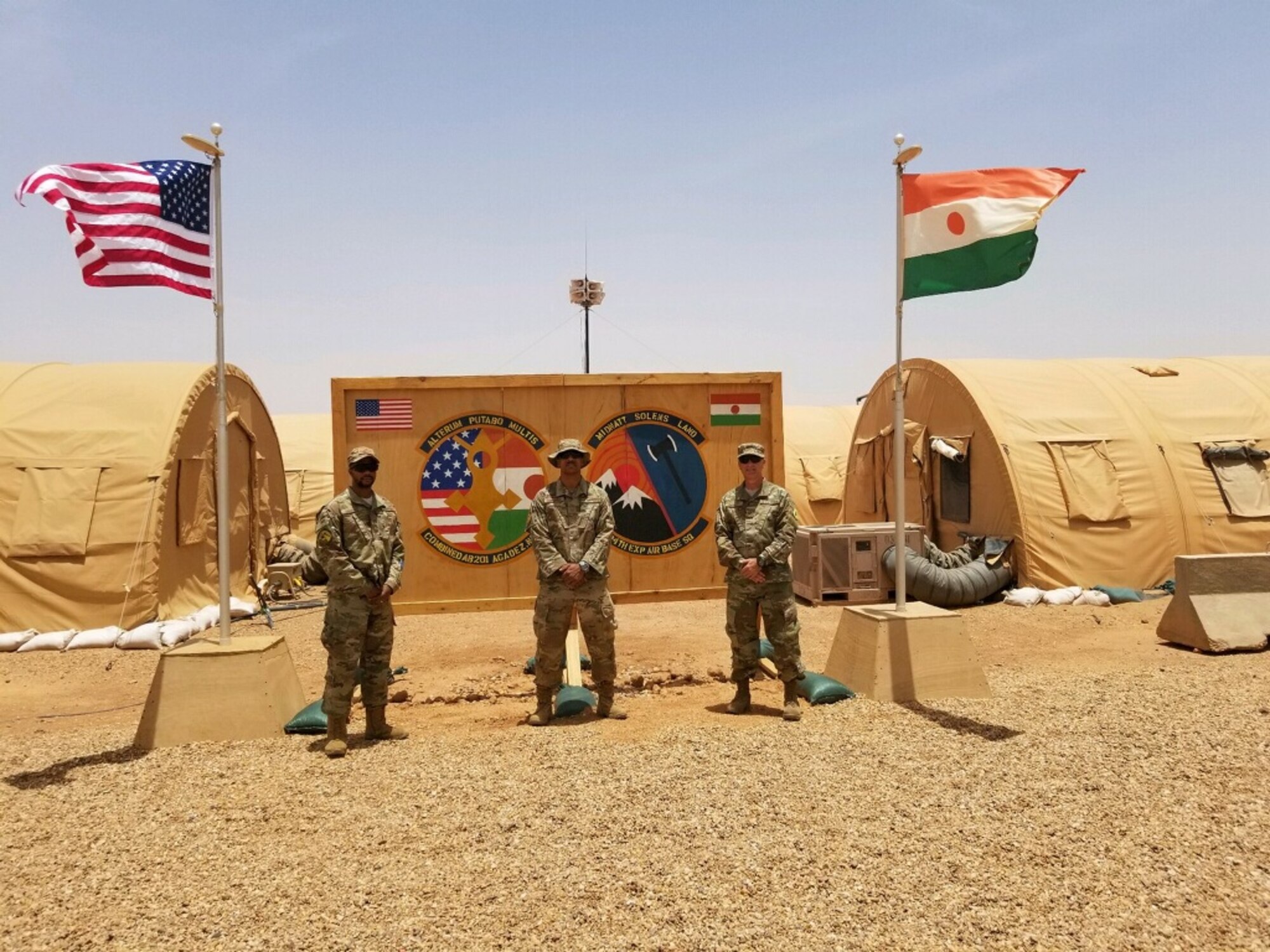 Tech. Sgts. James Baggott, Joshua Cummings, and Johnathan Simmmons, 403rd Logistics Readiness Squadron transportation specialists, deployed to Air Base 201, Agadez, Niger for a six-month tour conductions vehicle operations in the Logisitcs Readiness Flight for the 724 Expeditionary Air Base Squadron. The LRF was responsible for the transport of personnel, cargo and supplies. (U.S. Air Force photo provided by Tech. Sgt. James Baggott)