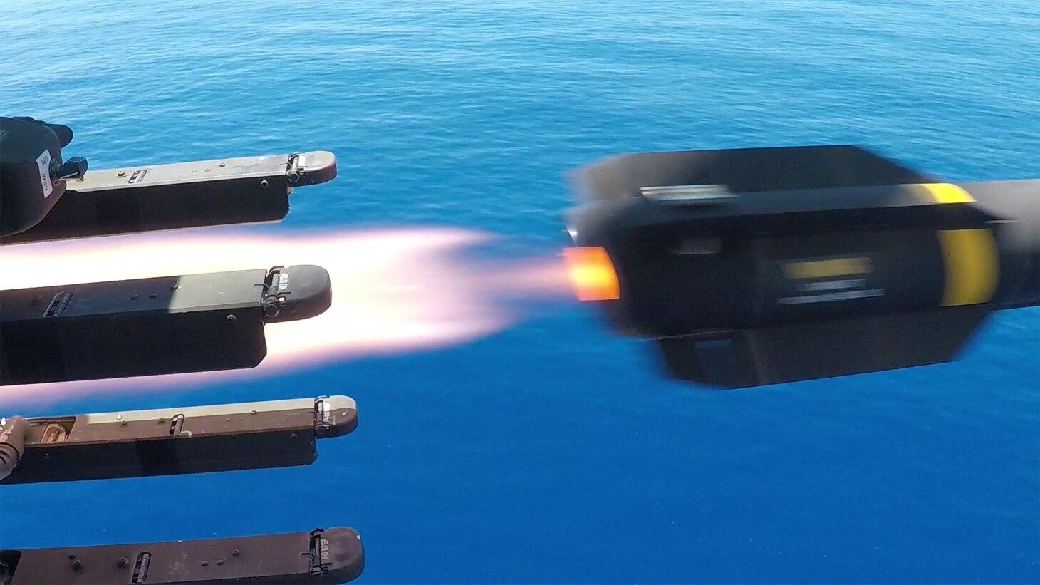 PHILIPPINE SEA (Oct. 1, 2019) An MH-60S Sea Hawk assigned to the “Island Knights” of Helicopter Sea Combat Squadron (HSC) 25 fires an AGM-114 Hellfire missile at the former USS Ford (FFG 54), a decommissioned frigate, as U.S. Navy ships, aircraft and a submarine and Republic of Singapore ships fire at Ford during a sinking exercise (SINKEX) as part of Exercise Pacific Griffin 2019. Pacific Griffin is a biennial exercise conducted in the waters near Guam aimed at enhancing combined proficiency at sea while strengthening relationships between the U.S. and Republic of Singapore navies.