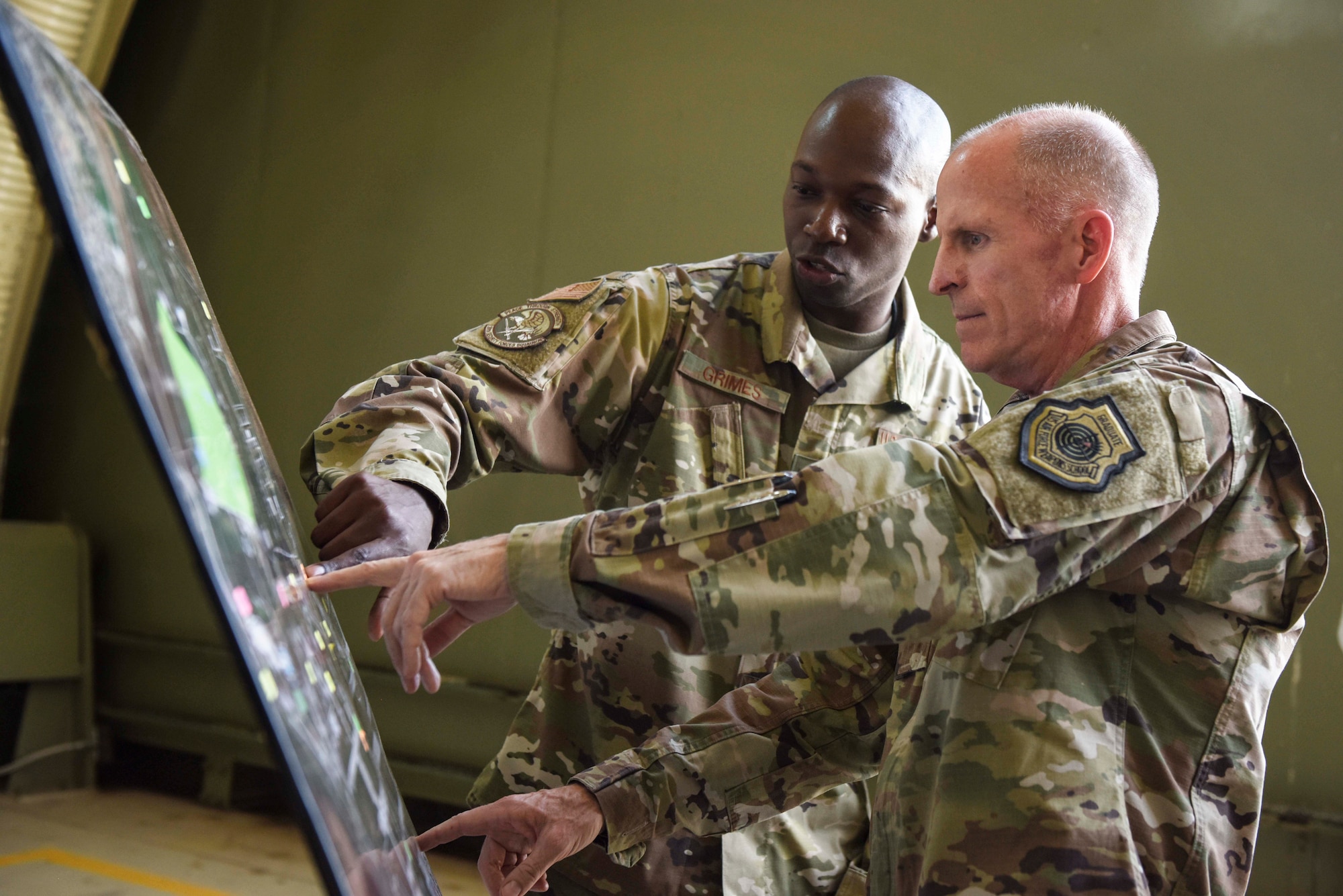 U.S. Air Force Vice Chief of Staff Stephen W. Wilson receives a briefing from Master Sgt. Kevin Grimes, 39th Security Forces Squadron non-commissioned officer in charge of security operations, during a visit to Incirlik Air Base, Turkey, Sept. 29, 2019. Wilson's tour of the installation included visits to various squadrons, in which he observed demonstrations of their mission readiness. (U.S. Air Force photo by Staff Sgt. Joshua Magbanua)