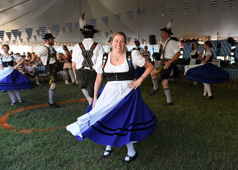 A member of the Original Elbe-Musikanten German Band dances during an Oktoberfest celebration at Joint Base Langley-Eustis, Virginia, Sept. 27, 2019.