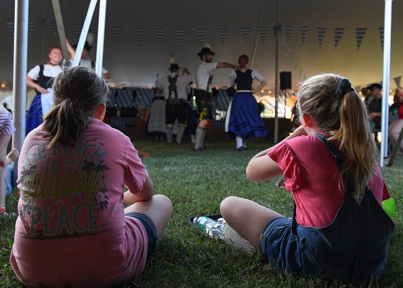 Children watch members of the Original Elbe-Musikanten German Band perform during an Oktoberfest celebration at Joint Base Langley-Eustis, Virginia, Sept. 27, 2019.