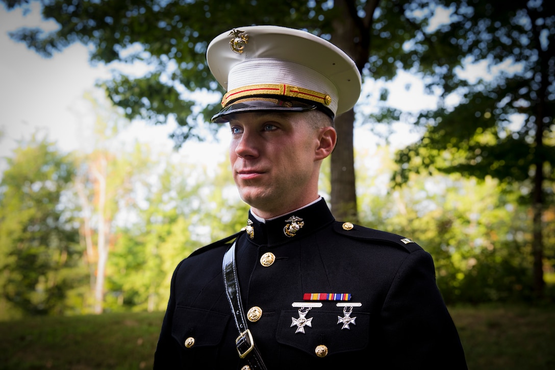 Second Lieutenant Michael McHale poses for a photo at Marine Corps Base Quantico, Virginia, August 23, 2019. McHale enlisted in the Marine Corps in 2015 before being accepted to the Enlisted Commissioning Program (ECP). The program is designed to provide the opportunity for Marines who have earned a four-year degree before enlisting in the Marine Corps or during active duty to serve as Marine Corps officers. Marines successfully completing the program receive a commission as a second lieutenant. Upon being accepted into the program, McHale completed Officer Candidates Course and the Basic School. He is now scheduled to attend to Logistics Operations School at Marine Corps Base Camp Johnson, North Carolina, where he will receive the military occupational specialty of basic logistics officer. (U.S. Marine Corps graphic illustration by Cpl. Naomi May)