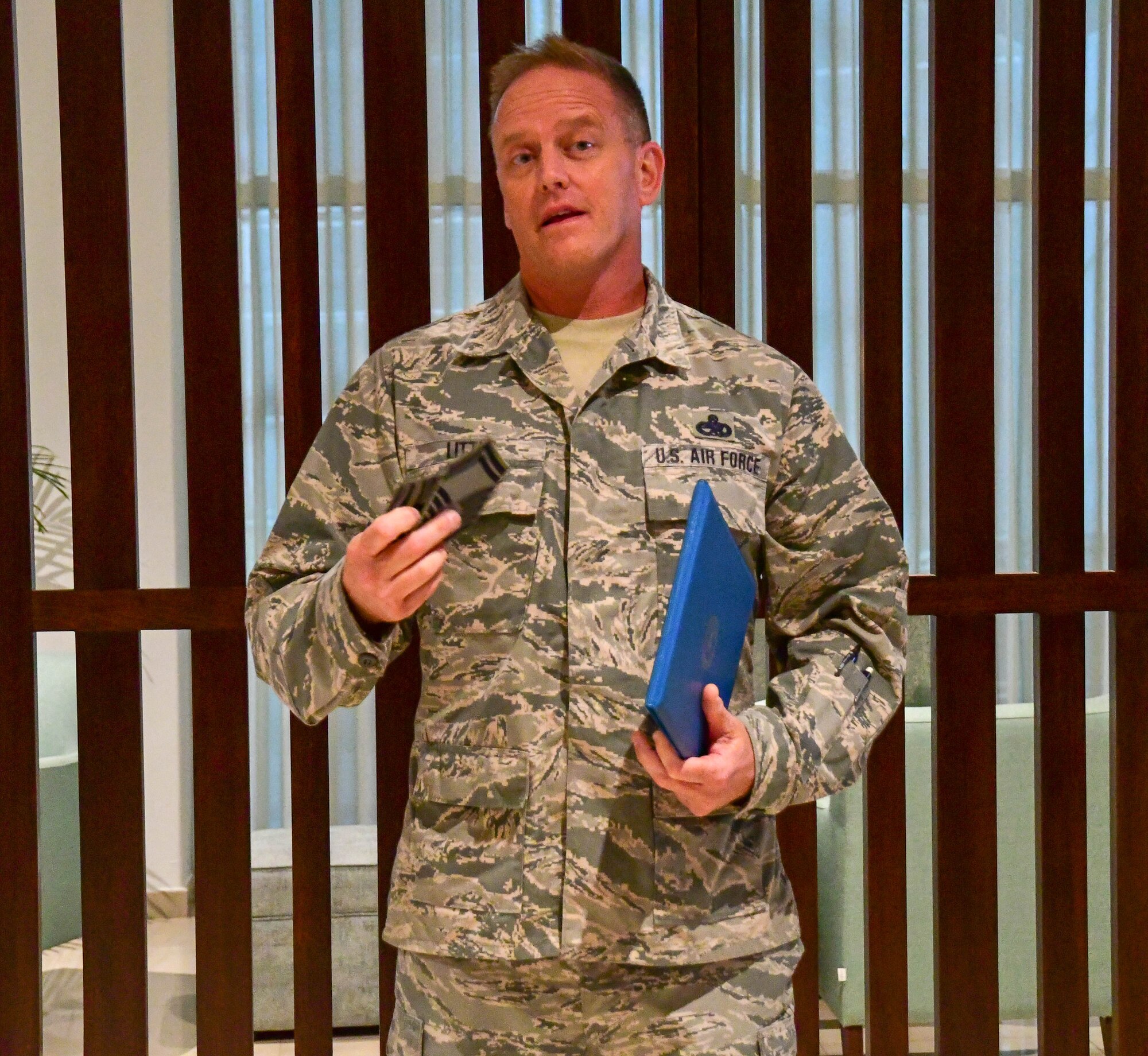 Senior Master Sgt. D.J. Little, 94th Maintenance Squadron hydraulics technician, speaks to a group at his promotion ceremony in Portugal on Sept. 30, 2019.