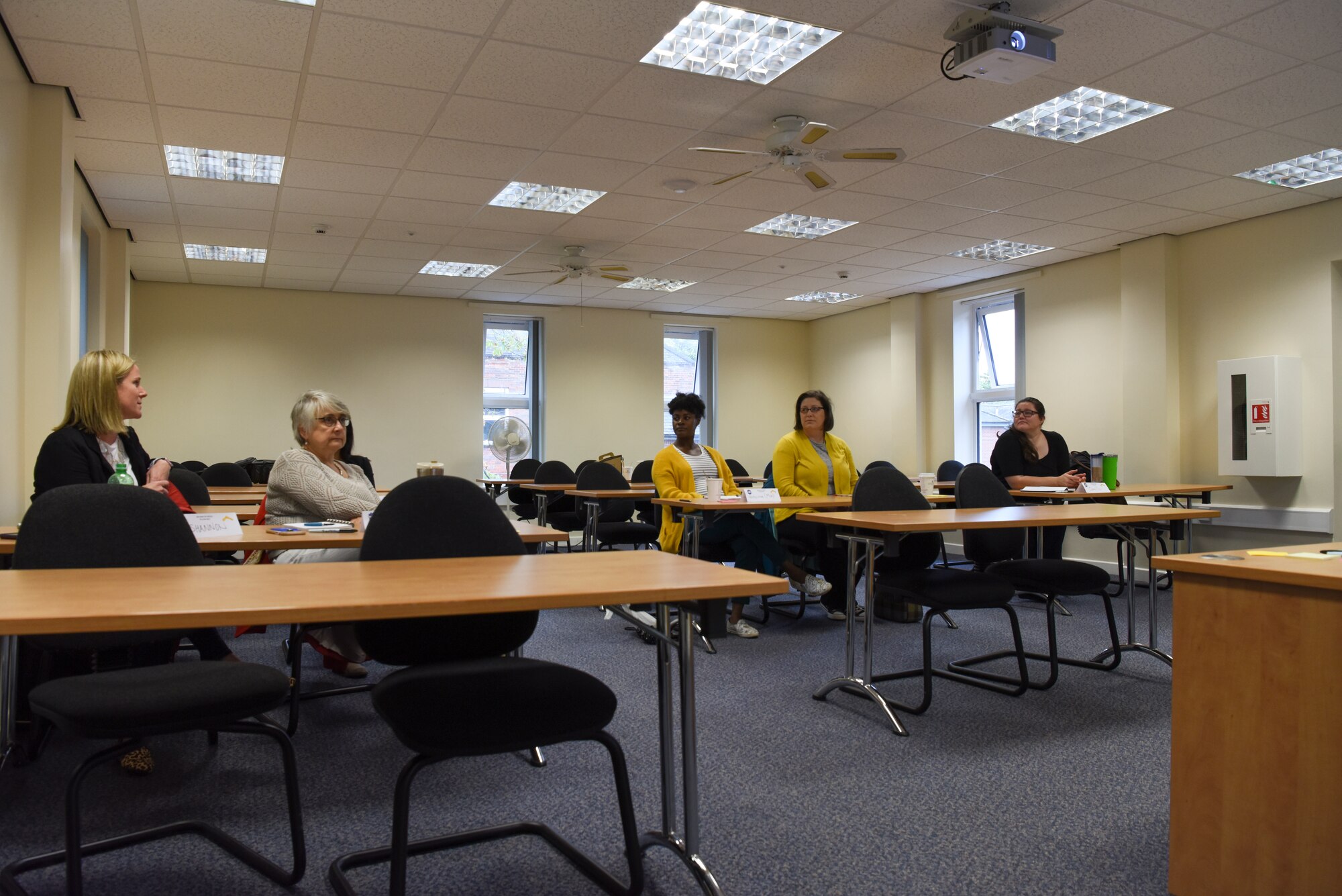 Military spouses introduce themselves before a continuous process improvement seminar at RAF Mildenhall, England, Sept. 26, 2019. Along with introductions, the spouses also expressed why they attended and what they wanted to gain from learning CPI methods. (U.S. Air Force photo by Staff Sgt. Matthew J. Wisher)