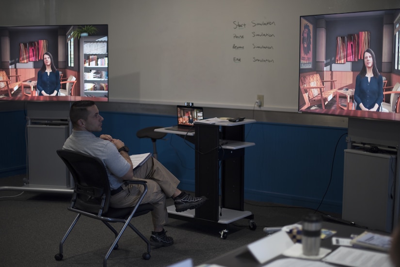 U.S. Air Force Capt. John Hoffecker, 204th Intelligence Squadron flight commander, listens to an artificial intelligence presentation during a live simulation – mixing reality leadership experience during a Flight Commander Course on Joint Base McGuire-Dix-Lakehurst, New Jersey, Sept. 27, 2019. The AI provided information based on the students’ responses which gives students a more realistic practice to complex interpersonal skills. (U.S. Air Force photo by Airman 1st Class Ariel Owings)
