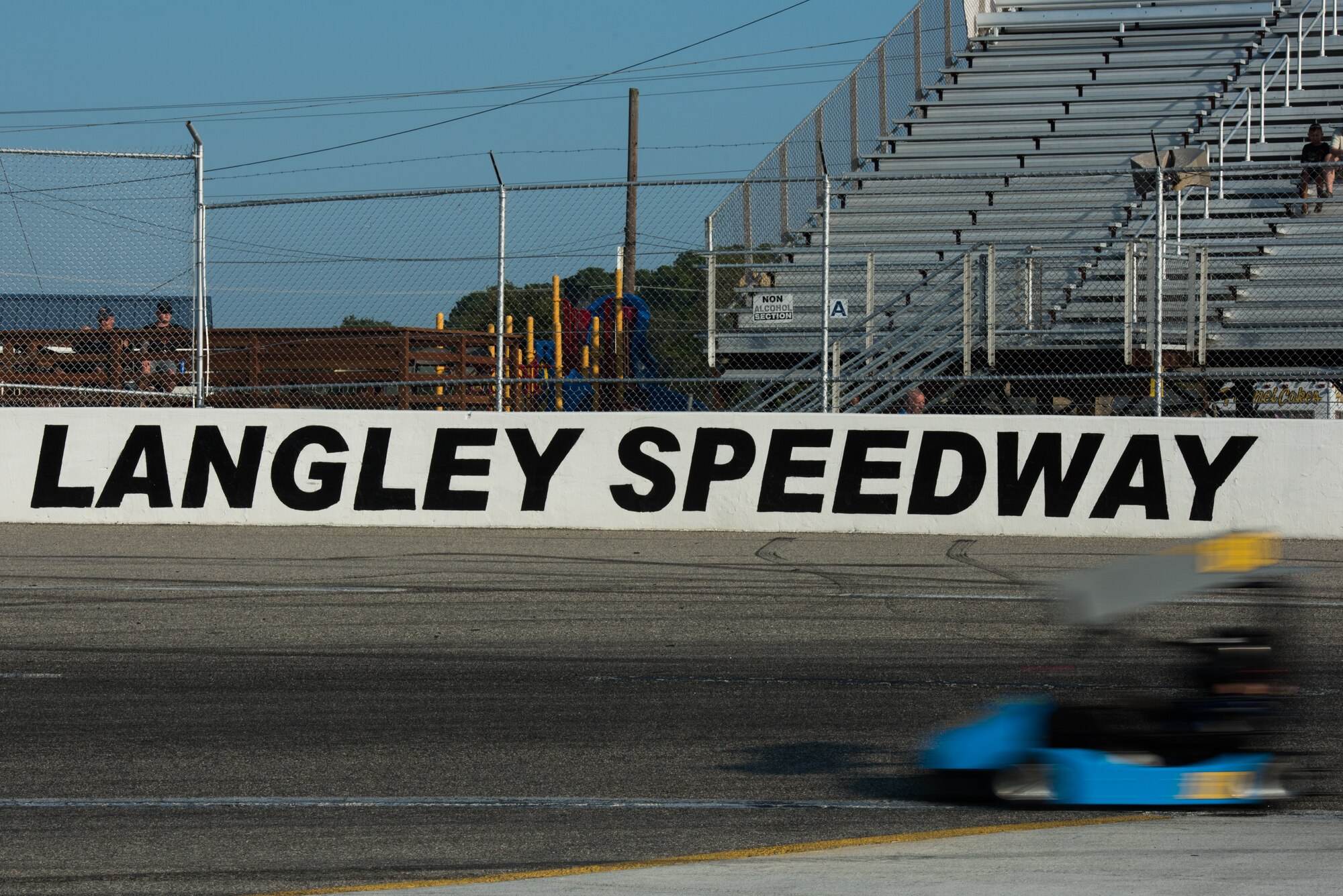 A race participant qualifies during the Military Appreciation Night at Larry King Law's Langley Speedway, Hampton, Virginia, Sept. 28, 2019.