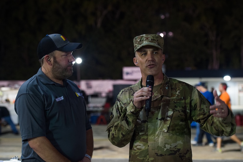 U.S. Air Force Col. Clinton Ross, 633rd Air Base Wing Commander, welcomes and thanks the crowd for attending the Military Appreciation Night at Larry King Law's Langley Speedway, Hampton, Virginia, Sept. 28, 2019.