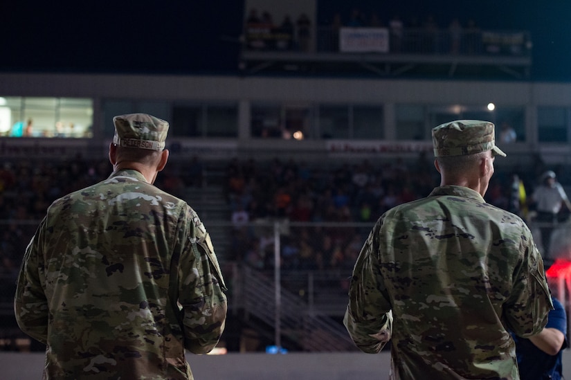 (Left to right) U.S. Air Force Chief Master Sgt. Greg Peterson, 633rd Air Base Wing command chief, and Col. Clinton Ross, 633rd ABW commander, welcomes and thanks the crowd for attending the Military Appreciation Night at Larry King Law's Langley Speedway, Hampton, Virginia, Sept. 28, 2019.