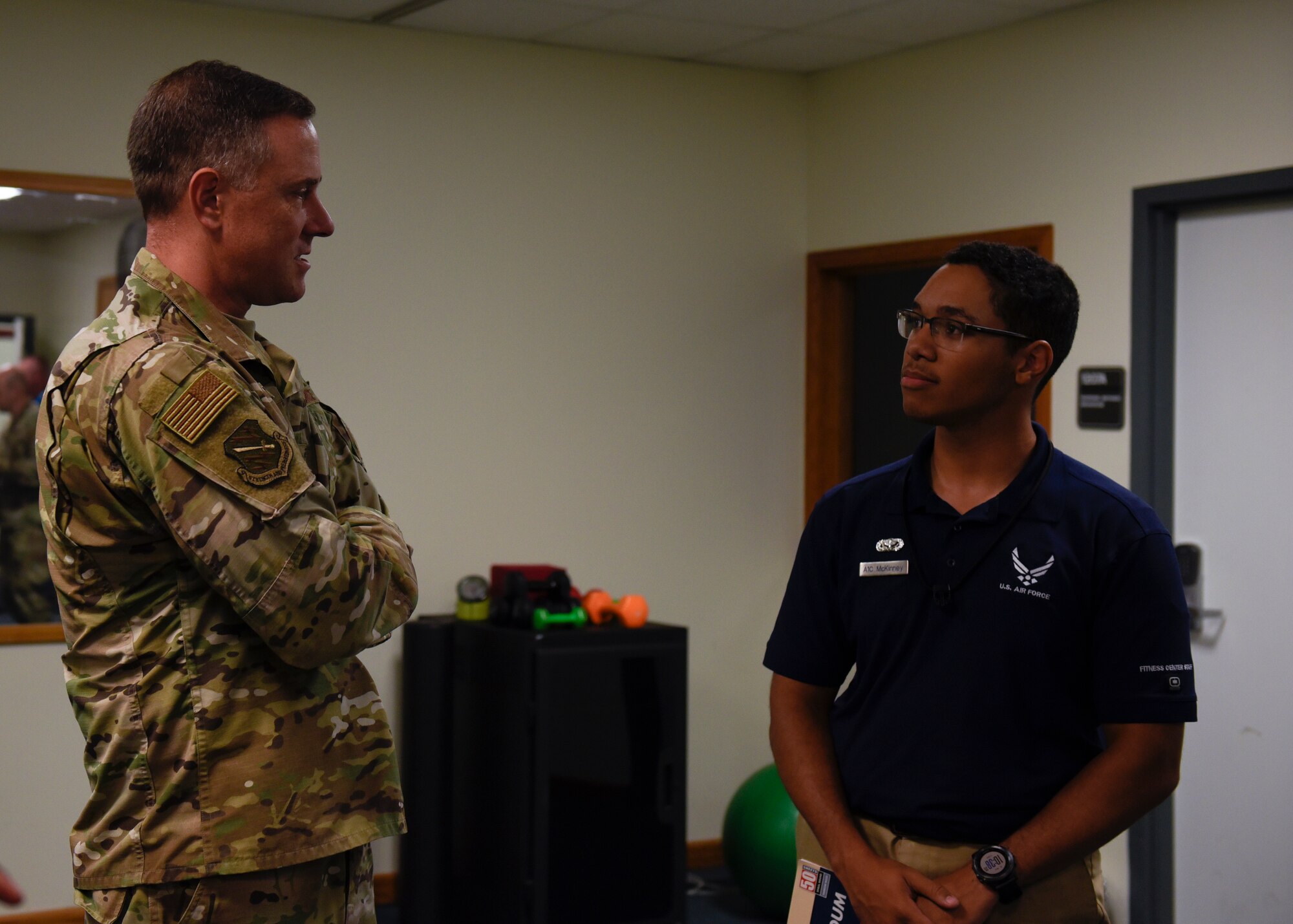Col. Thomas Flazarano, 21st Space Wing commander, meets with Airman First Class James McKinney, 21st Force Support Squadron fitness specialist, Sept. 6, 2019 at Cheyenne Mountain Air Force Station, Colorado. McKinney is one of the Airmen from Peterson that helps to maintain the fitness centers inside of the Mountain. (U.S. Air Force Photo by Airman Alexis Christian)
