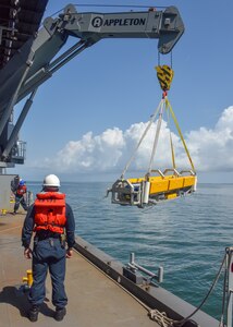 Naval Surface Warfare Center Panama City Division (NSWC PCD) provided equipment, personnel, and expertise to demonstrate the modular capability of the Mine Countermeasure (MCM) Mission Package (MP) aboard the United States Naval Ship Hershel “Woody” Williams (T-ESB 4) earlier this month. NSWC PCD is the lead engineering activity for MCM MP.