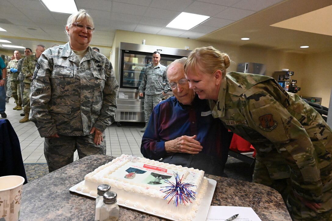 Senior Master Sgt. Susan Schroeder, of the 119th Communications Flight, gives a hug to retired Chief Master Sgt. Fred Quam during the annual 119th Wing Chief’s Council retiree breakfast at the North Dakota Air National Guard Base, Fargo, N.D., Oct. 2, 2019.