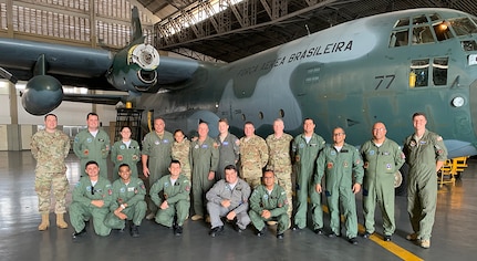 Airmen from the New York Air National Guard's 109th Airlift Wing pose with members of the Brazilian Air Force's 1st Squadron, 1st Transport Group at Galeao Air Base in Rio de Janeiro during a State Partnership Program exchange in September 2019. The 109th Airlift Wing discussed Antarctic flying with their Brazilian counterparts. The New York National Guard entered into a state partnership with Brazil in March 2019.