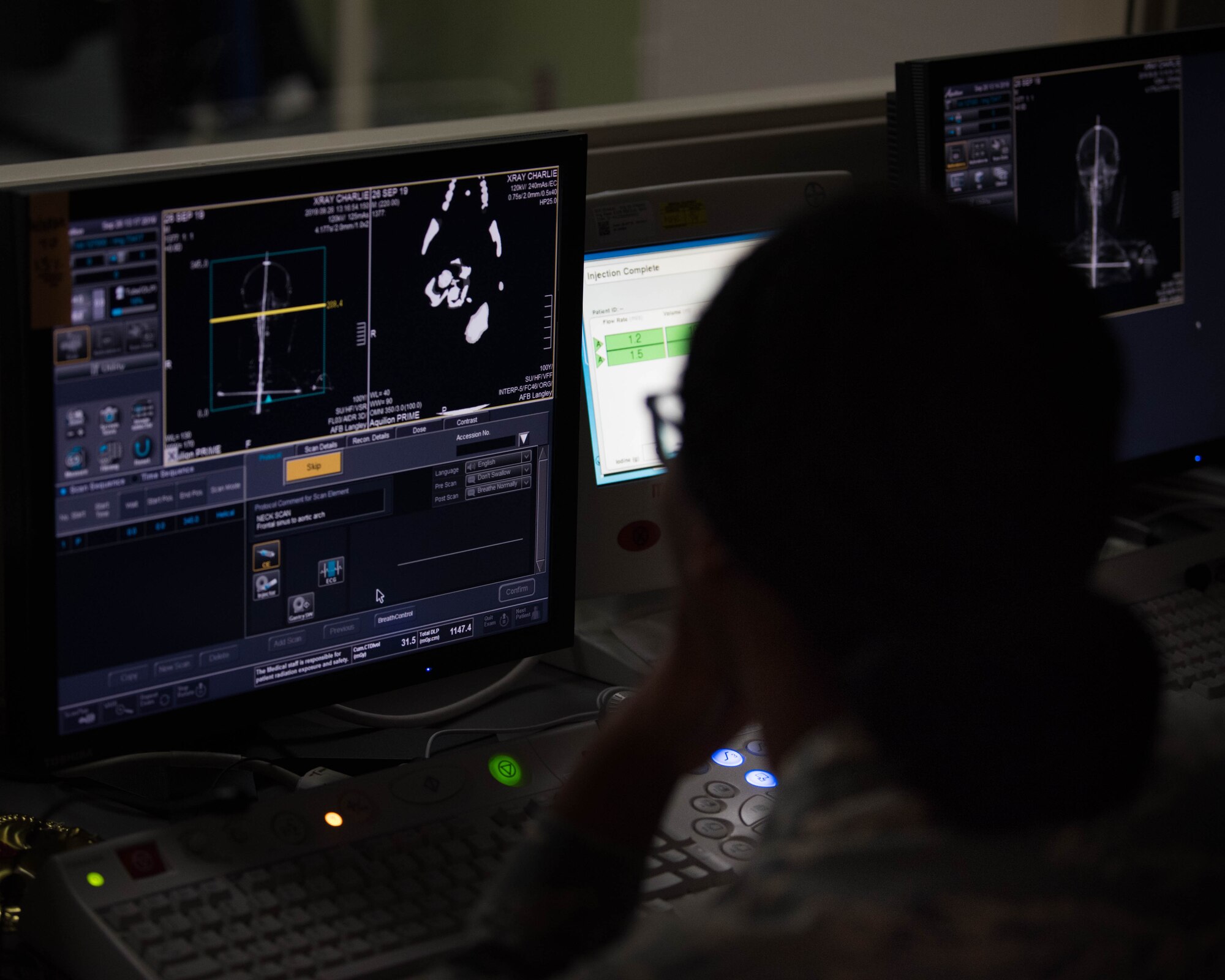 U.S. Air Force Senior Airman Jaclyn Johnson, 633rd Surgical Operations Squadron radiology tech, evaluates a practice image taken during radiology trauma training on Joint Base Langley-Eustis, Virginia, Sept. 26, 2019. Members of the 633rd SGCS practiced transporting patients, taking X-rays and evaluating medical injuries during their training. (U.S. Air Force photo by Airman 1st Class Marcus M. Bullock)